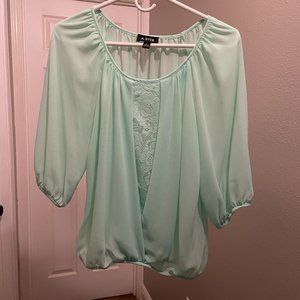 A.Byer medium light green blouse